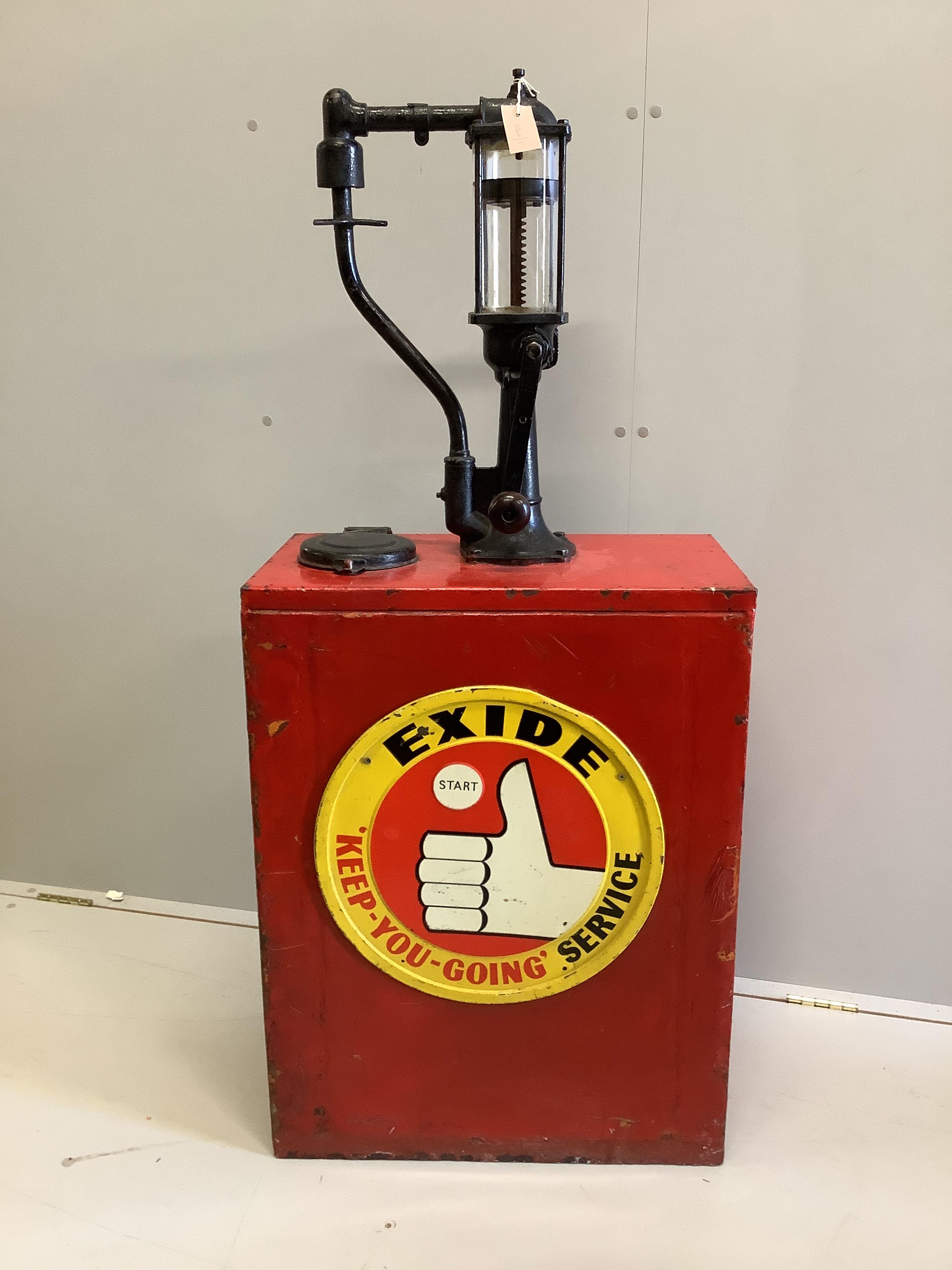A vintage American Exide engine oil pump, width 58cm, depth 32cm, height 130cm